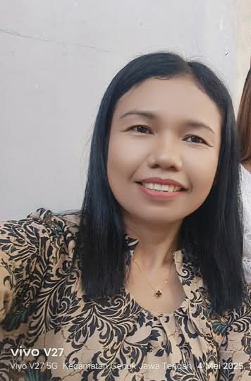 Masraini Sinaga, S.Pd.